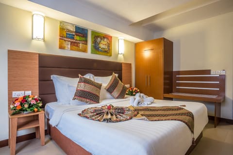 Economy Room | Premium bedding, memory foam beds, in-room safe, individually decorated