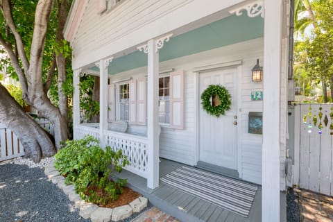 Gated yard with private front porch seating