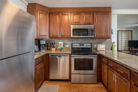 Fully equipped kitchen includes a coffee grinder to appreciate Kona coffee