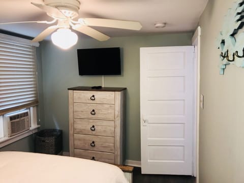 Bedroom 2. Has one bed, full size. 