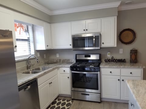 Granite counter tops ~ New Stainless Appliances