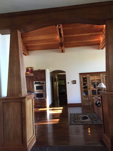 Toward the guest wing from dining room, passing through kitchen & great room