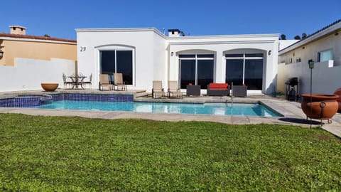 the view of the house faces out to the ocean with steps down to the beach! 
