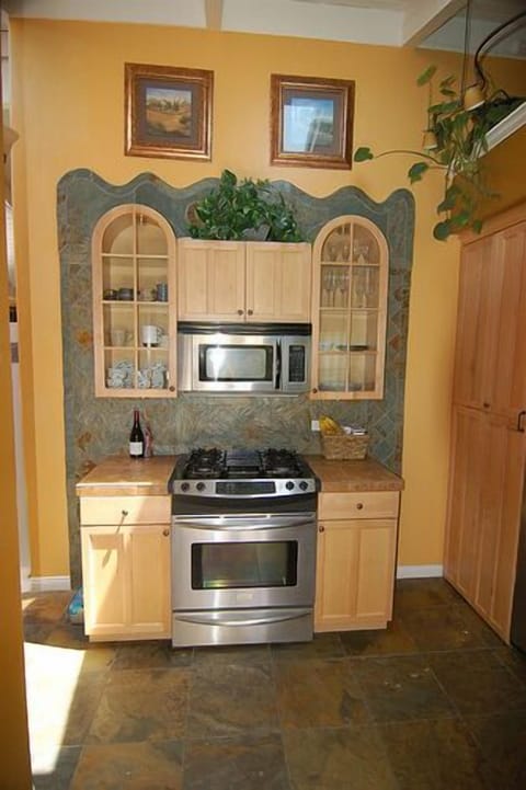 kitchen with stove, microwave