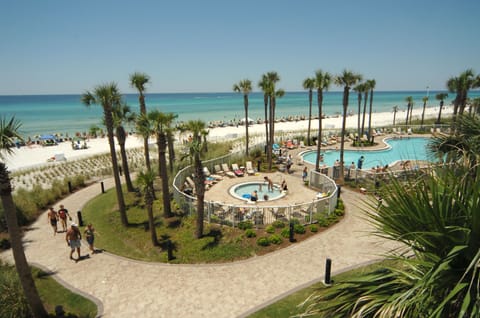 Tropical beach front pool area with kiddie pool