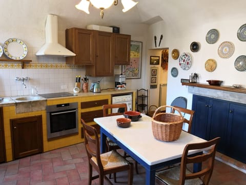 The kitchen is traditional Tuscan style and well-equipped, with all mod cons.