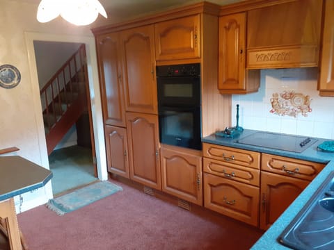 Fridge Freezer to left of Cooker and 4 Ring Hob