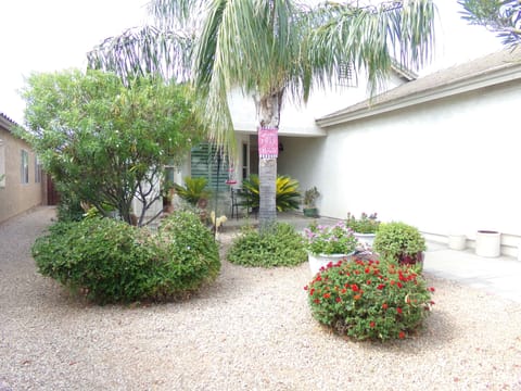 The front of the property also has room for 4 chairs.