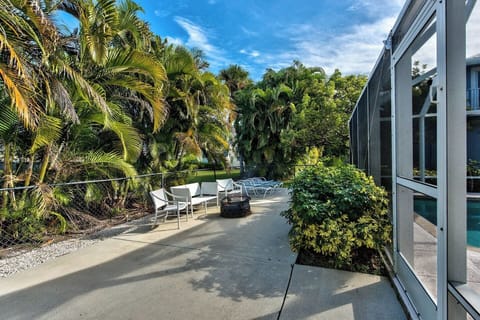 Additional unscreened sunning and fire-pit area.