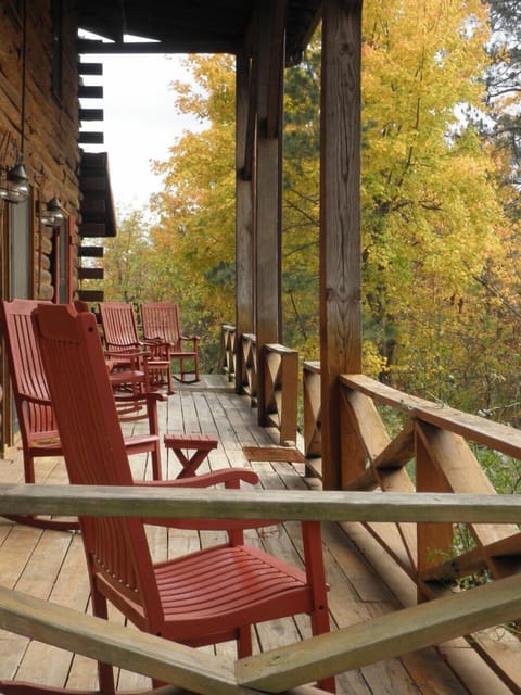 Relax while rocking on the covered porch while watching deer and wildlife