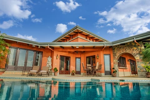 CASA ANTIGUA FROM THE INFINITY EDGE POOL DAYTIME