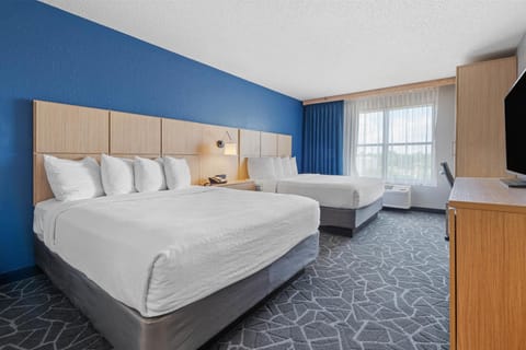 Premium bedding, pillowtop beds, desk, blackout drapes