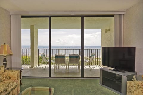 Livingroom looking toward patio and beach/ocean
