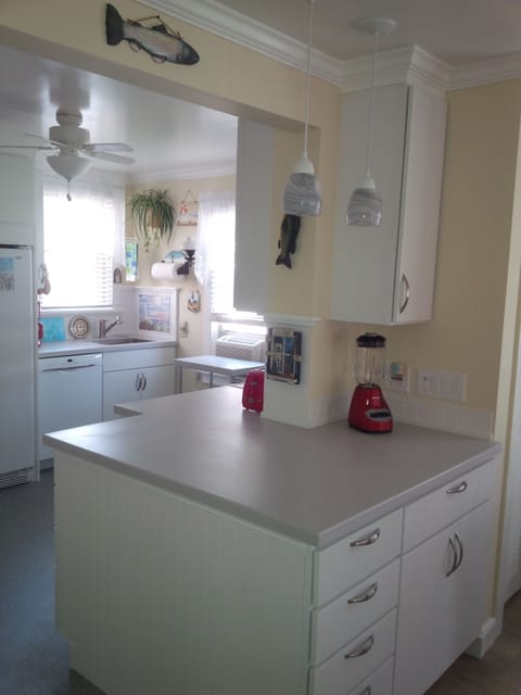 Kitchen has  great new service bar area, plenty of storage for food items