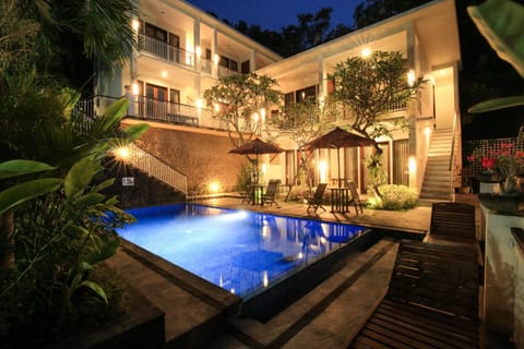 Outdoor pool, open 6:00 AM to 10:00 PM, pool umbrellas, sun loungers