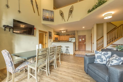 Unit seats 8 at main table, 3 at kitchen counter, 4 at side table, 4 at fliptop 