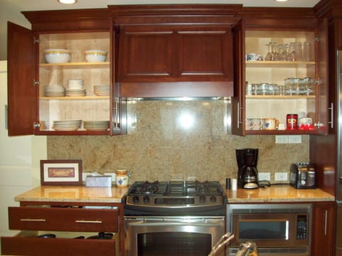 Dishes and small appliances for your convenience.