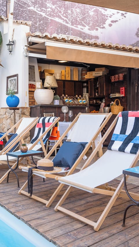Seasonal outdoor pool, open 8:00 AM to 10:00 PM, sun loungers