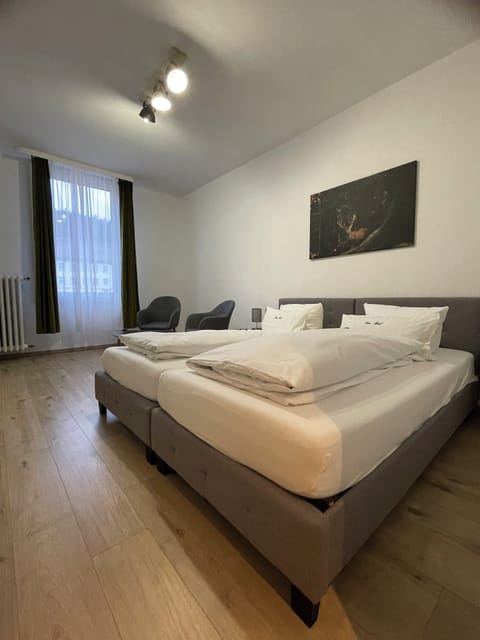 Family Room | Down comforters, free WiFi, bed sheets