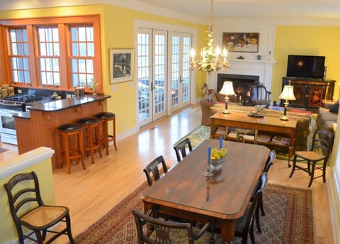 Dining Room with Living room and fire, porch, kitchen