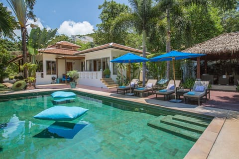 Baan Jasmine and its stunningly large Bali stone pool & sun loungers