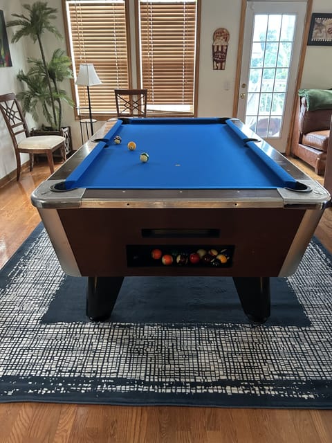Large den -regulation-size pool table. New felt cover. Indoor basketball game