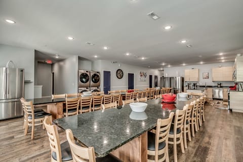 Extended Kitchen and dining room with 2 tables and laundry area #1