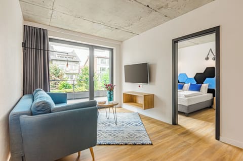 Family Apartment | Private kitchen | Fridge, electric kettle