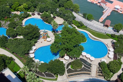 Indoor pool, seasonal outdoor pool, pool umbrellas, sun loungers