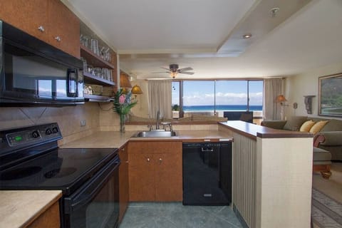 Signature Condo | Private kitchen | Full-size fridge, microwave, coffee/tea maker, electric kettle