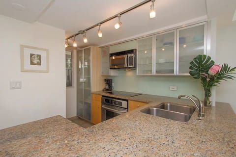 Signature Condo | Private kitchen | Full-size fridge, microwave, coffee/tea maker, electric kettle