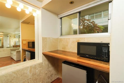 Signature Condo | Private kitchenette | Full-size fridge, microwave, coffee/tea maker, electric kettle