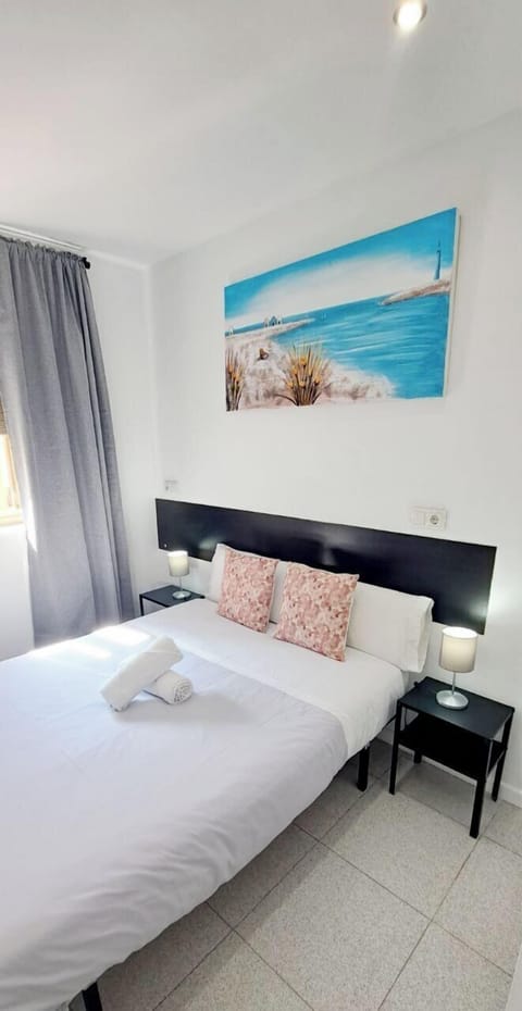 Economy Double Room, Private Bathroom | 1 bedroom, desk, blackout drapes, iron/ironing board