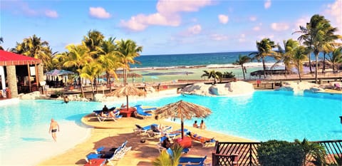 Outdoor pool, open 7:30 AM to 11:00 AM, pool umbrellas, sun loungers