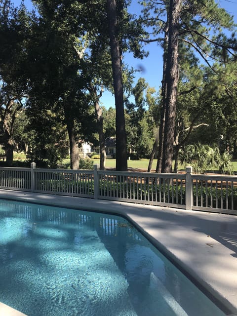 Elevated deck & swimming pool.