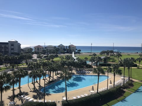 The fabulous view from our top floor balcony.  2 pools: 1 heated, one not