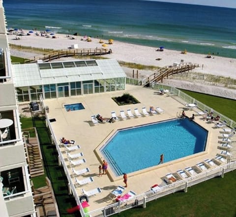 View from unit balcony to pool area and beach