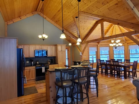Main floor kitchen and dining area with seating for 14