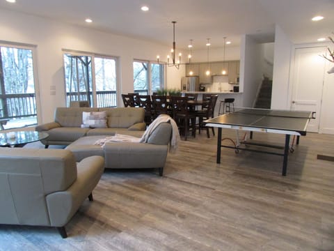 Lower Level with full kitchen and dining area and large deck overlooking lake.