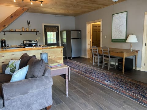 Kitchen area is open to living area so you can enjoy the view of the lake