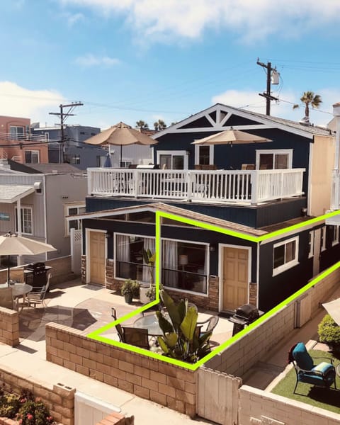 The cottage is the east unit on the ground-level of our three-unit building.