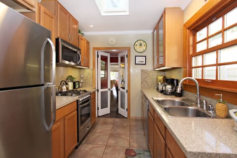 *Kitchen view to living room. Very modern with all appliances and large skylight