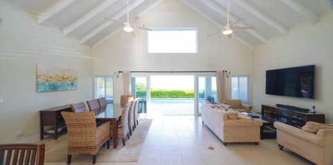 Panoramic pool and Chalk Sound views from living and dining room
