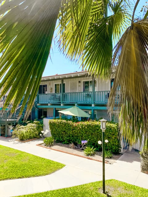 Costal Casita is located on the second floor, right above the umbrella.