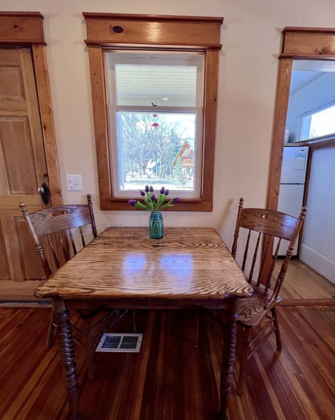 Breakfast table in kitchen. 