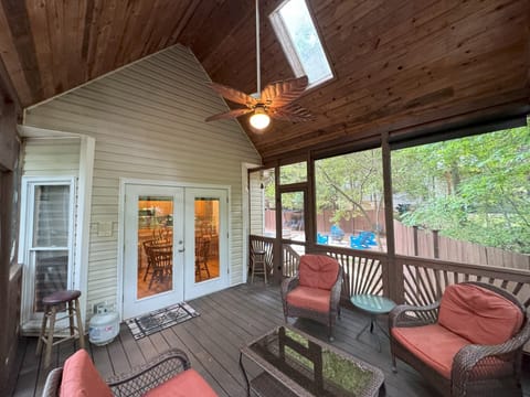 A screened porch provides refuge from bugs, sun, and the occasional rain storm.