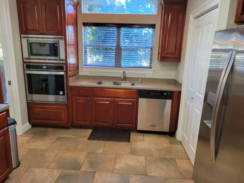 Kitchen continues with a spacious pantry