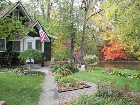 Riverside Patio with Fieldstone BBQ, beautiful landscape and Park like setting