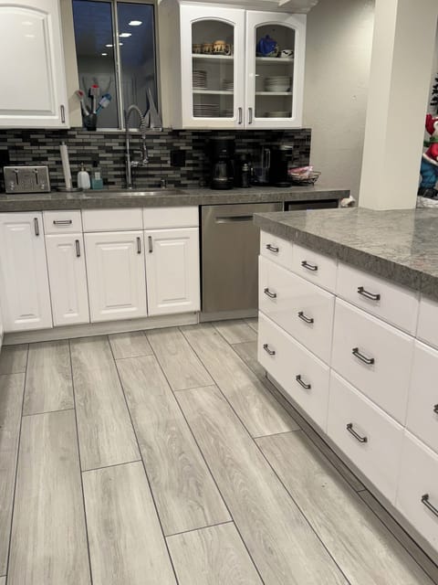 Kitchen with center island & wine refrigerator