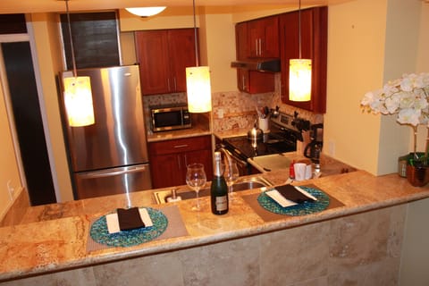 kitchen opens up to the living room